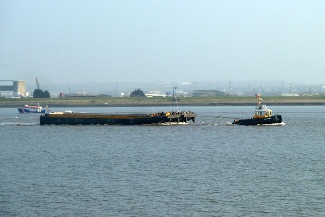 Tug 'SWS Essex' and tow heading upriver