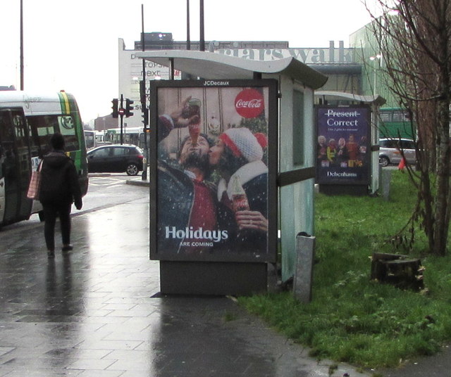 Coca-Cola advert on a city centre bus shelter, Newport