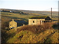 Old railway goods van and barn near Rookhope village