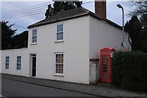 TF1509 : Cottage with former phone box by Bob Harvey