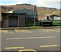 Stone bus shelter at the edge of Crynant Business Park