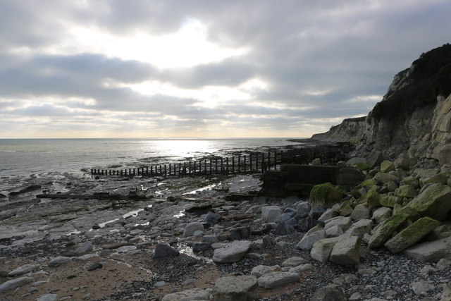 Smashed and broken groynes at Holywell, Eastbourne