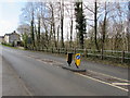 Keep Left signs on an island on the A4109, Pantyffordd