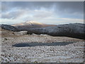 NN2900 : Part-frozen lochan on Tullich Hill by Alan O'Dowd