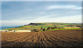 NZ6919 : Ploughed field south of Brotton by Trevor Littlewood