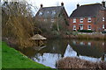 Pond and houses in Lavender Road, Throop