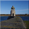 NX0940 : Port Logan lighthouse by Ian Taylor