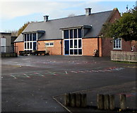 SO7708 : School building and playground, Whitminster by Jaggery