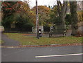 Wooden bench on grass, Church Stretton