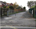 Gates across the access road to Whitminster Playing Field