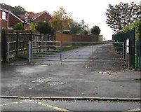 SO7708 : Gates across the access road to Whitminster Playing Field by Jaggery