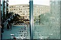 View of the footbridge on York Road reflected in South Bank Place