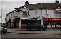 TQ5283 : Shops on Rainham Road, South Hornchurch by David Howard
