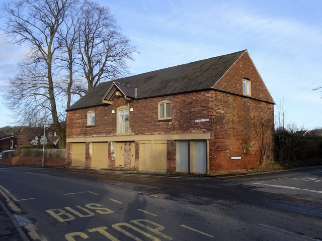 Former coach house converted into houses