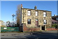 House and communications mast on White Lee Road, Batley