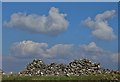 Tumbledown wall and interesting clouds