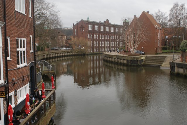 View of the Norwich University of the Arts St. George's Campus reflected in the Wensum from Fye Street Bridge by Robert Lamb