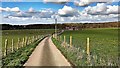 Track heading north to Tottington Manor Farm Cottages