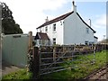 Large gate with small house attached