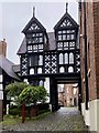 Cobbled street and medieval house