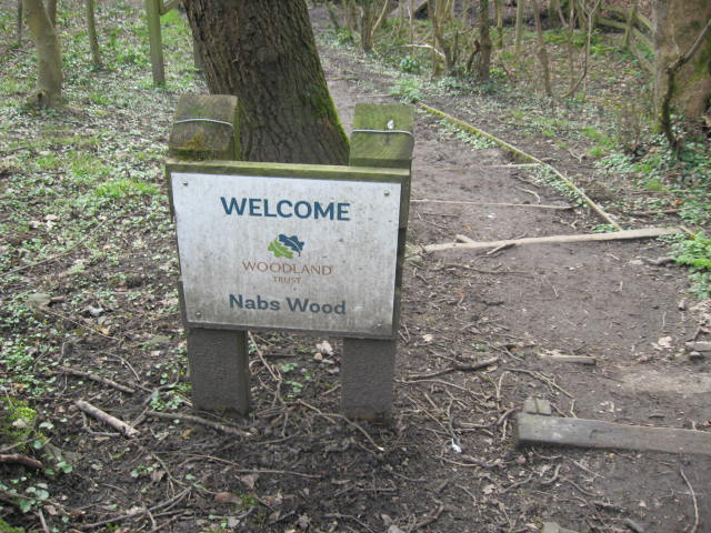 Welcome sign at entrance to Nabs Wood