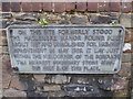 Historical sign at the junction of High Street and Three Gates Lane