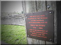 Plaque at a field entrance in Stoatley Rise