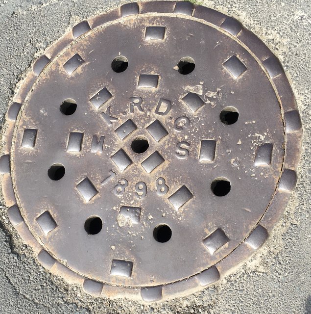 Cast iron manhole cover