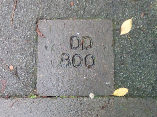 DD marks in pavement on South Road, Caernarfon