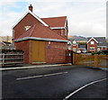 Single-storey brick building at the southern edge of Knoll Gardens, Abergavenny