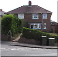 Two dark green cabinets on a Brynglas corner, Newport