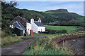 Cottage, post office and telephone box by the Canna farm