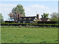 Cottage at Sneads Green from across the fields