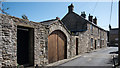 Multiple doors into properties at south end of Church Lane