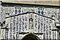 TM2480 : Weybread: St. Andrew's Church, south porch detail by Michael Garlick