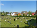 The Eastern edge of Petersfield Cemetery and the houses on Luker Drive