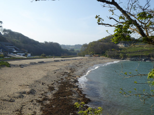 An empty Maenporth beach on a fine spring day
