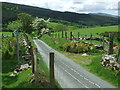 SH7141 : Footpath And Country Road by Keith Evans