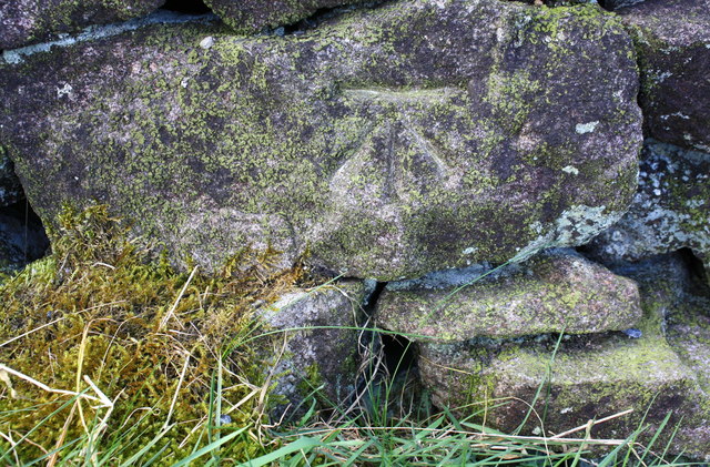 Benchmark on stone in wall on southwest side of Black Gill Lane