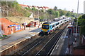 TransPennine Express train departing Morley Station for Leeds