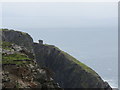 G5674 : Napoleonic  war  watch  tower  on  Carrigan  Head by Martin Dawes