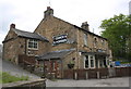 Coach & Horses pub set back  from west side of B6057