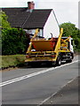 Yellow skip in transit, Llanfrechfa, Torfaen