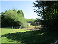 Gap in the hedge by the sewage works