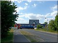 East Midlands Railways train on Stoke Lane crossing