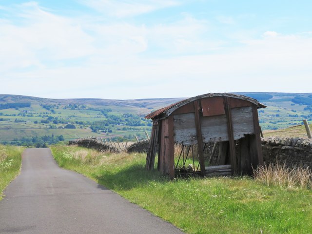 Old railway wagon by the roadside