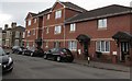 From brick to stone on the east side of London Street, Newport