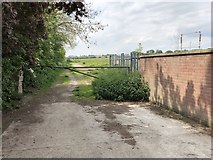 TA0333 : Entrance to waste ground and fields by Darren Haddock