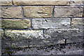 Benchmark on works building at east end of Shipley Fields Road