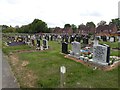 NZ2769 : Graves, Longbenton Cemetery by Graham Robson